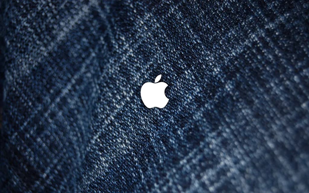 Folded denim jeans showing seam and wash detail