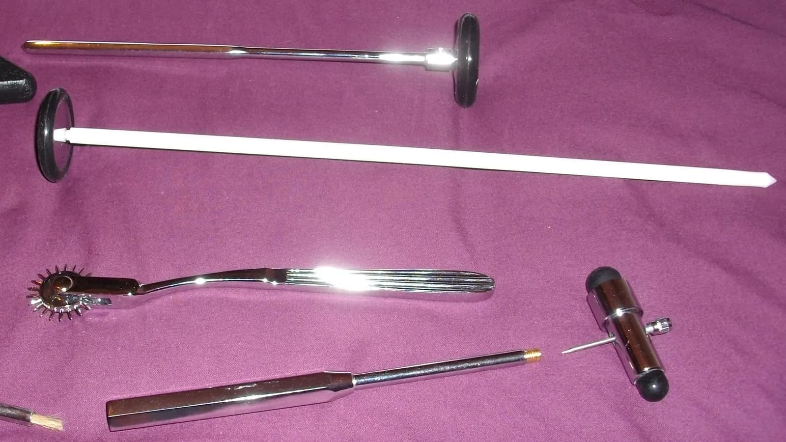 Neurological examination tools including a reflex hammer