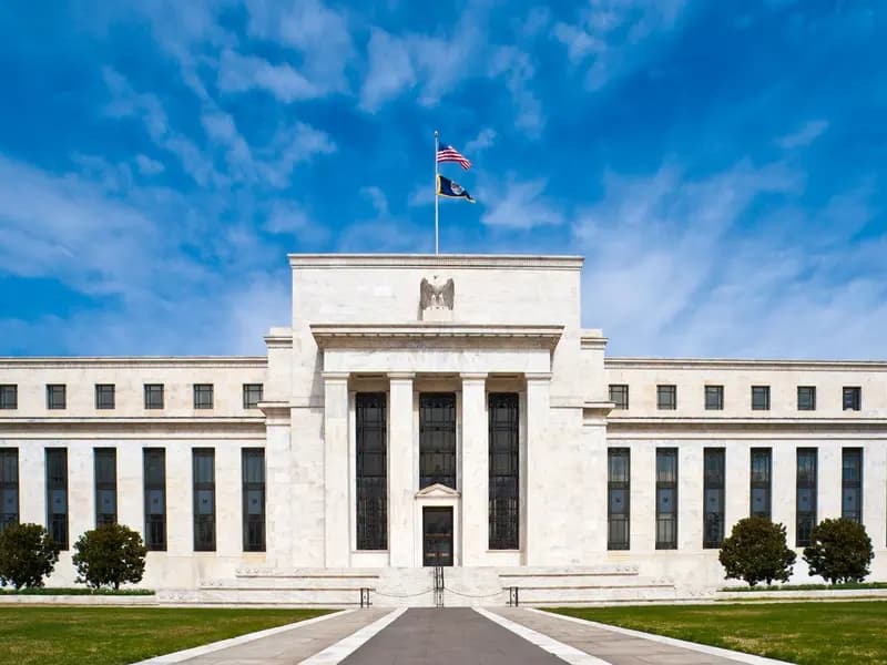 The Marriner S. Eccles Federal Reserve Board Building in Washington, headquarters of the Board of Governors, photographed head on from the lawn