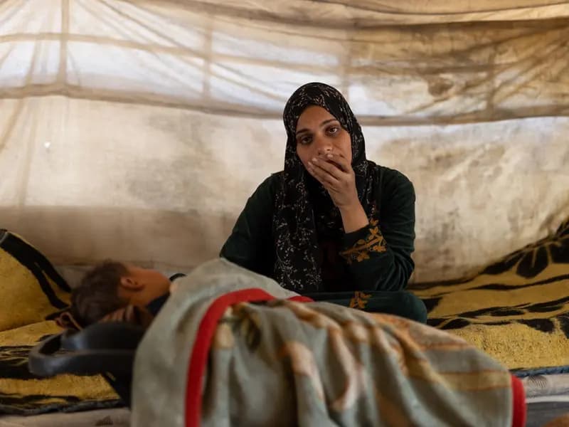 A family offering one another calm practical support during a period of conflict