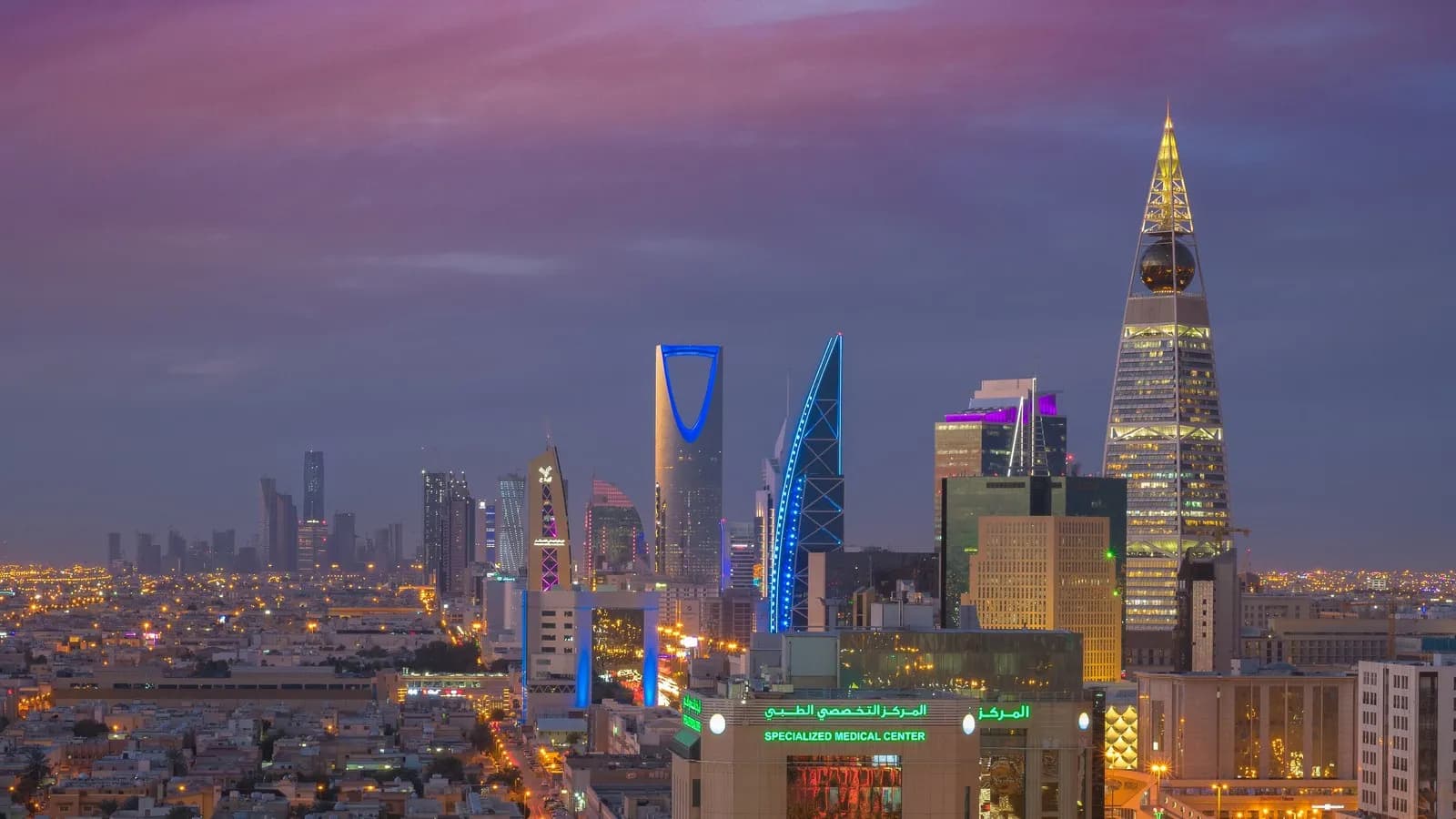 The Riyadh skyline at dusk, with the Kingdom Centre and Al Faisaliah towers, photographed in 2018