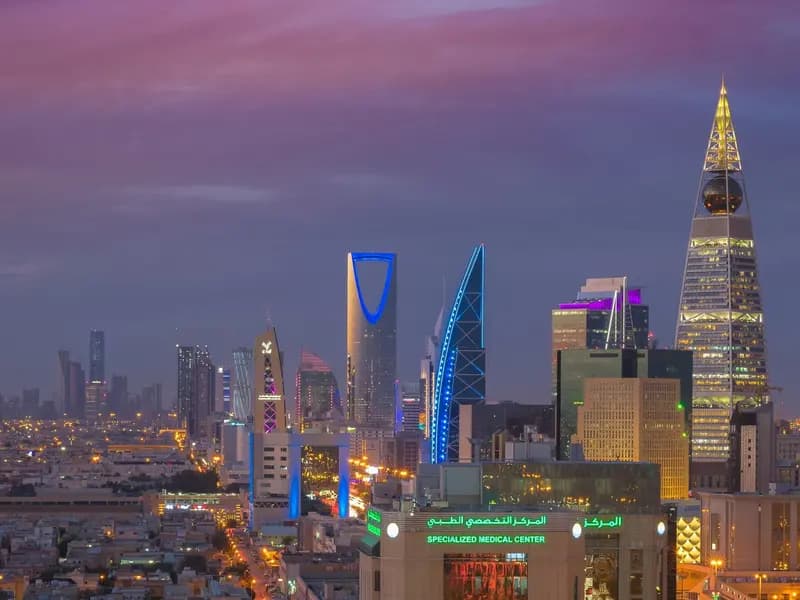 The Riyadh skyline at dusk, with the Kingdom Centre and Al Faisaliah towers, photographed in 2018