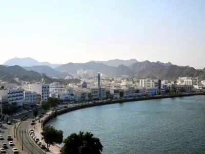 Muttrah waterfront and mountain landscape in Muscat, Oman
