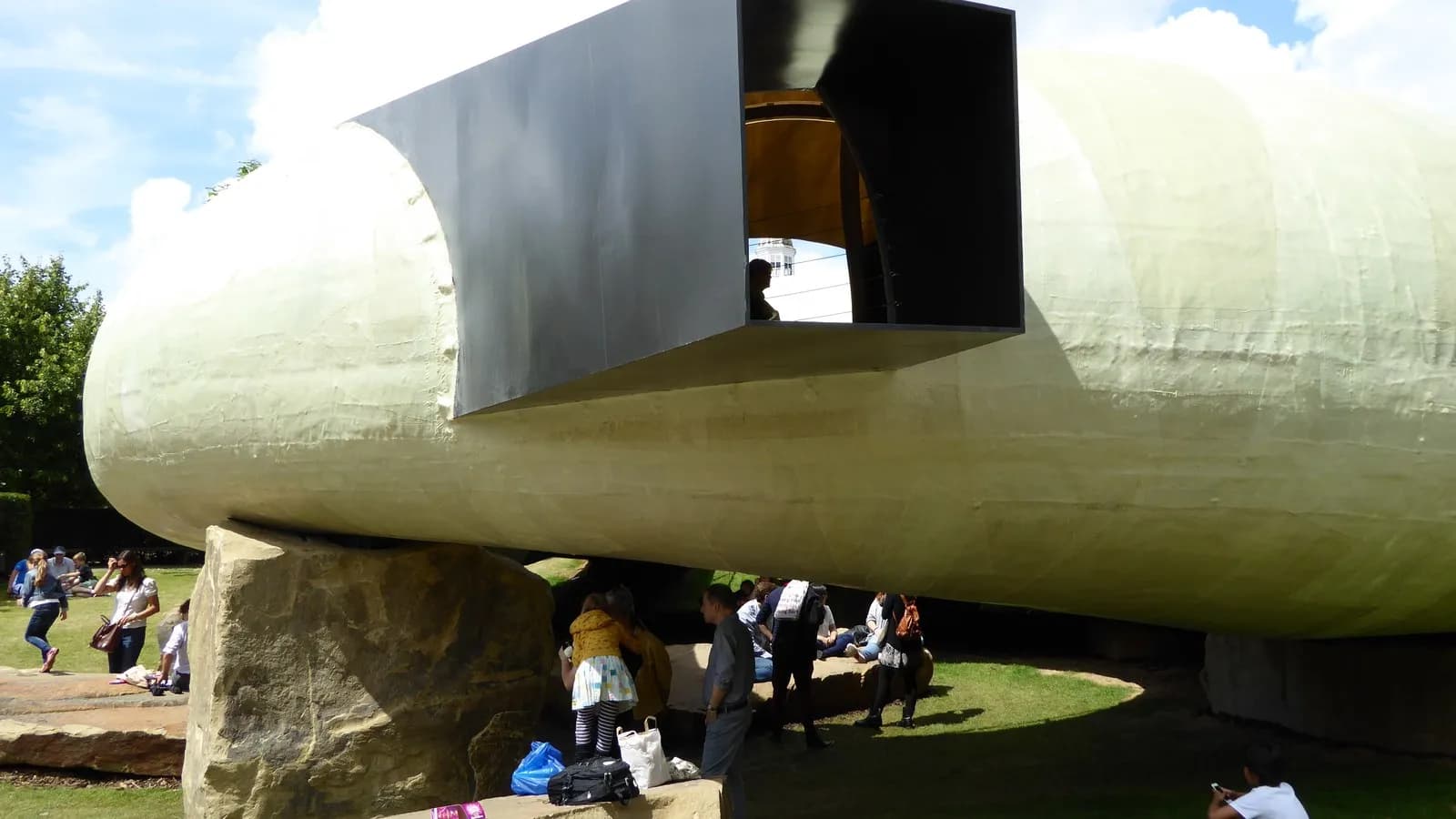 Smiljan Radic's 2014 Serpentine Gallery Pavilion in London, a shell resting on rough stones