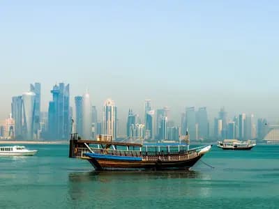 Doha's waterfront skyline during an evening suited to summer sightseeing