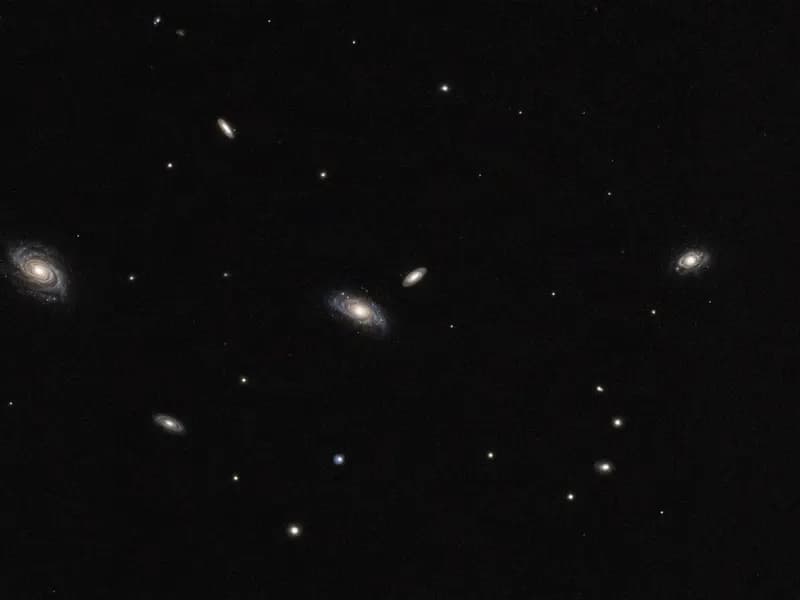 A wide field of sky scattered with distant galaxies of similar scale