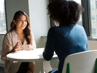 Saudi women collaborating in a modern workplace