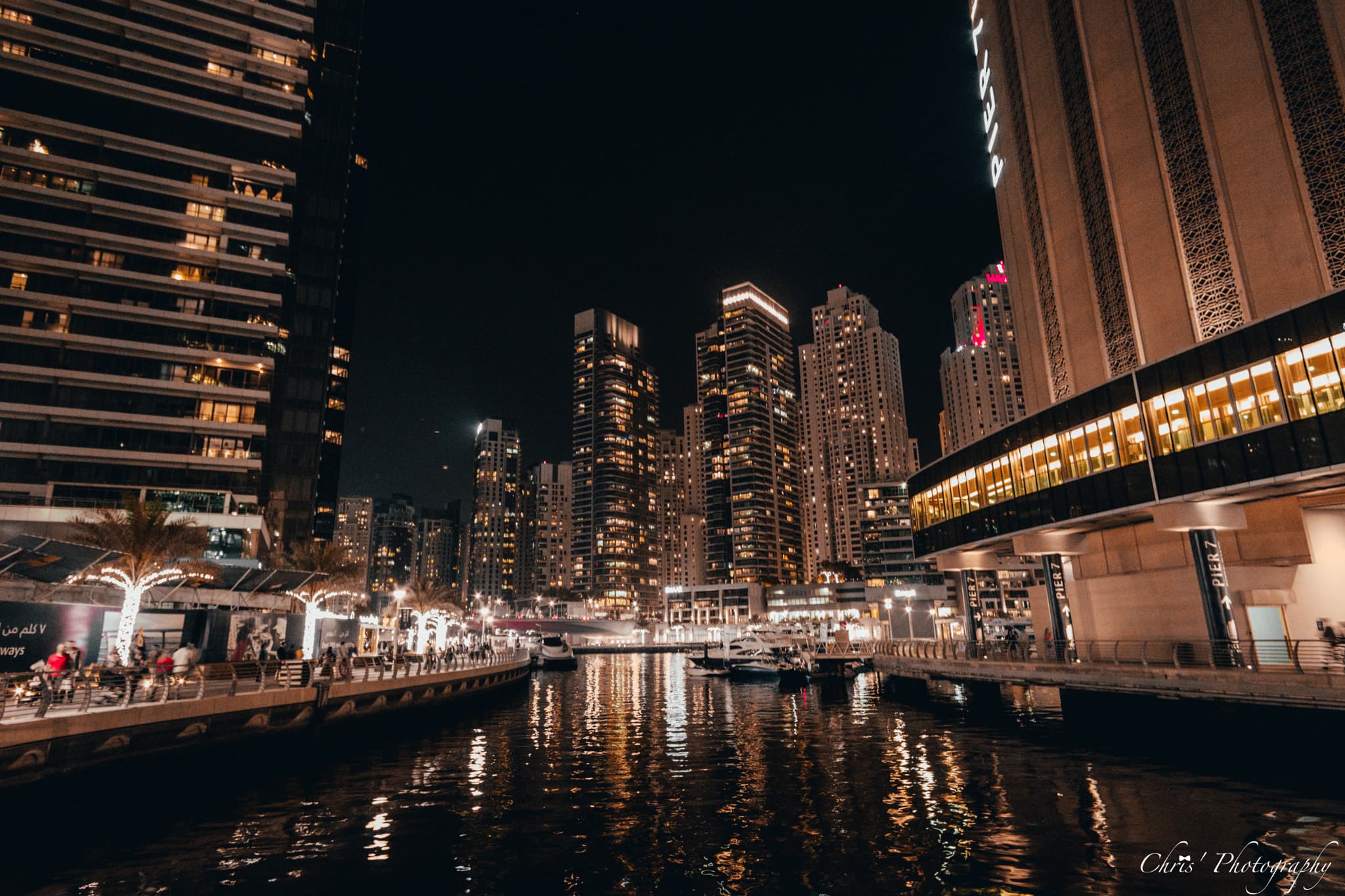 The Dubai skyline at dusk with illuminated skyscrapers, representing the UAE's push into regulated digital currency