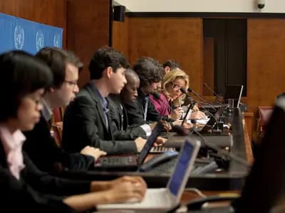 Delegates at an international forum discussing global AI governance