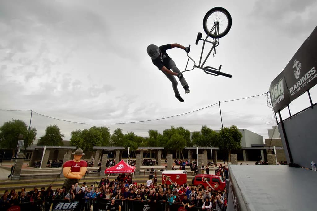 An action-sports athlete competing before a festival crowd