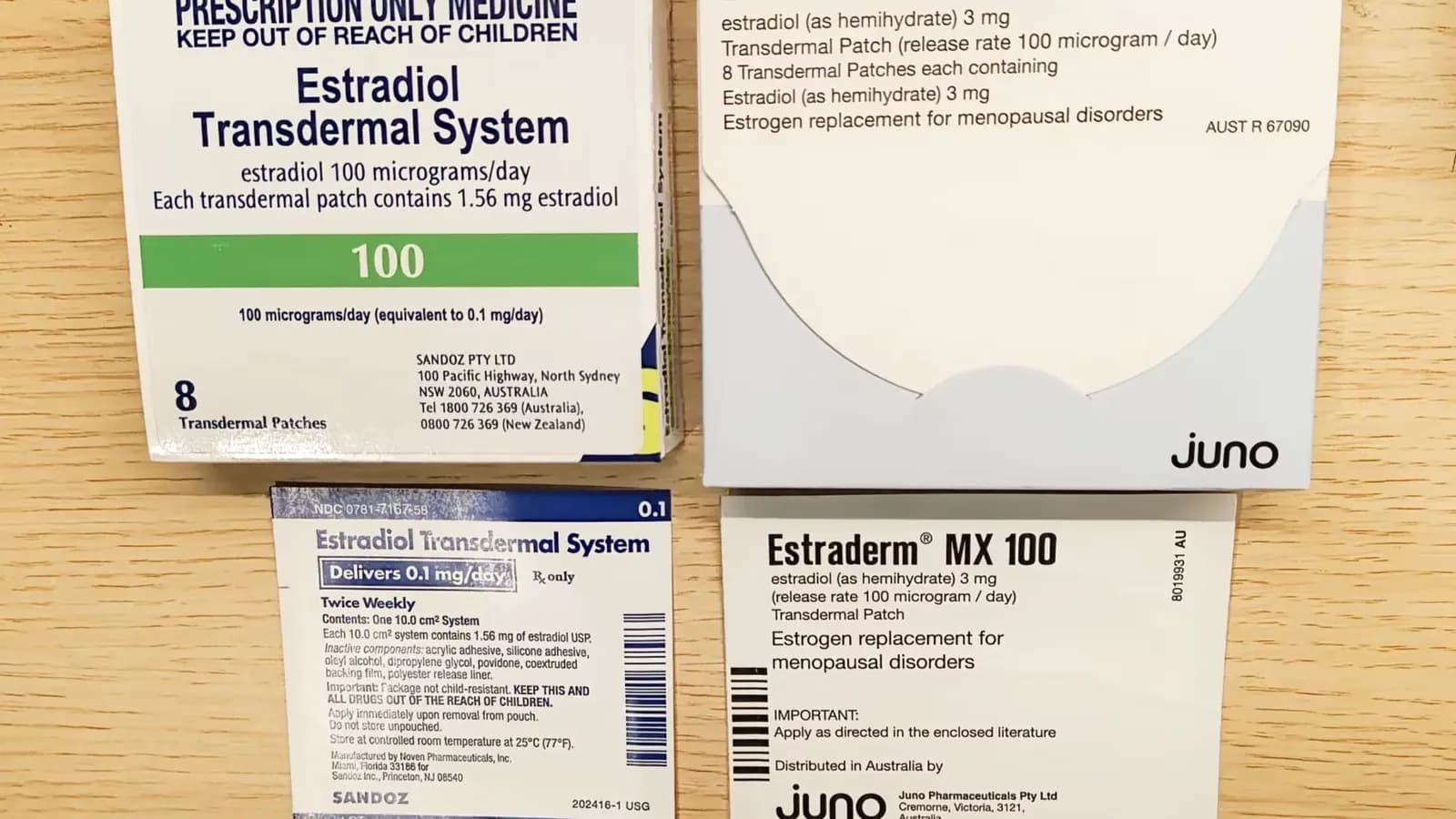 Several boxes of estradiol transdermal patches from different manufacturers laid on a wooden table, photographed on 4 June 2025, a file photograph illustrative of menopausal hormone therapy and not of the ACOG guideline