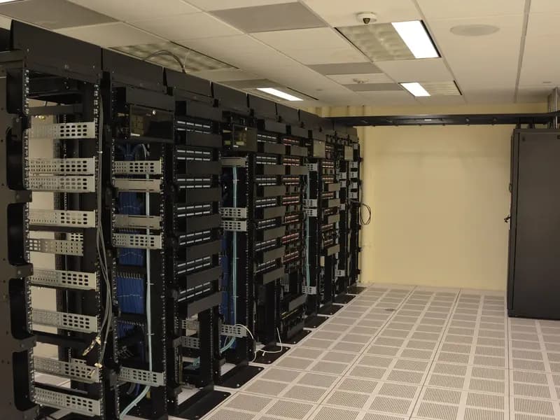 Server racks inside a data center, illustrative of the cloud infrastructure covered by the Akamai-Anthropic deal and not a specific Akamai facility, photographed in November 2015