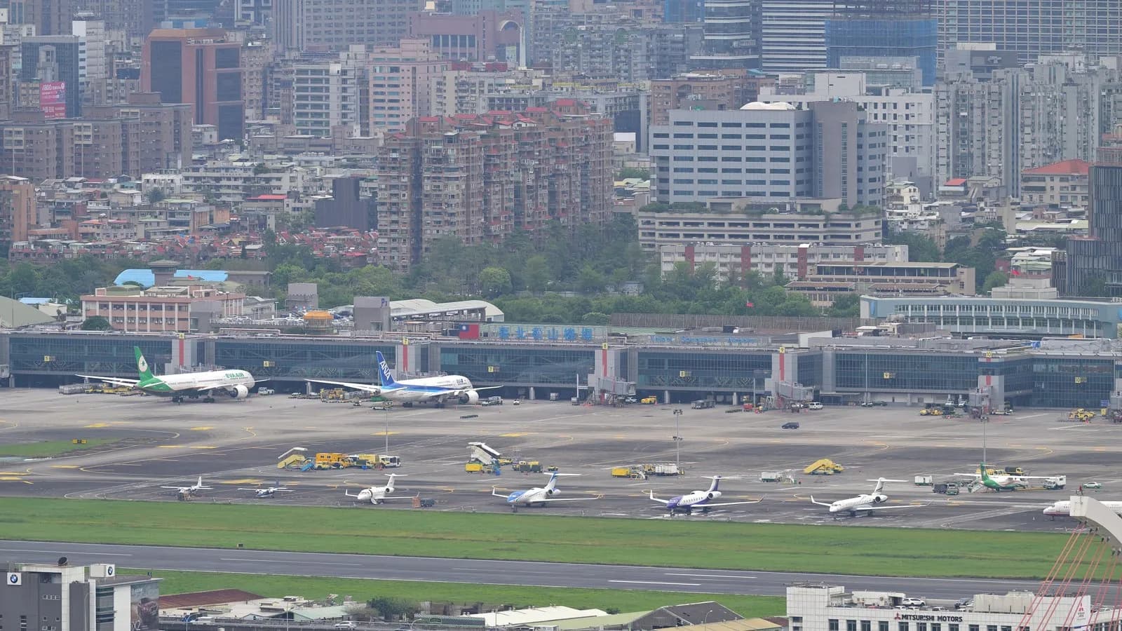 Taipei's Songshan Airport observation deck, illustrative of Taiwan air travel and not a Starlux aircraft, photographed in April 2026