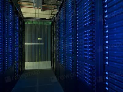 Rows of illuminated server racks in a modern data center, evoking large-scale AI model infrastructure