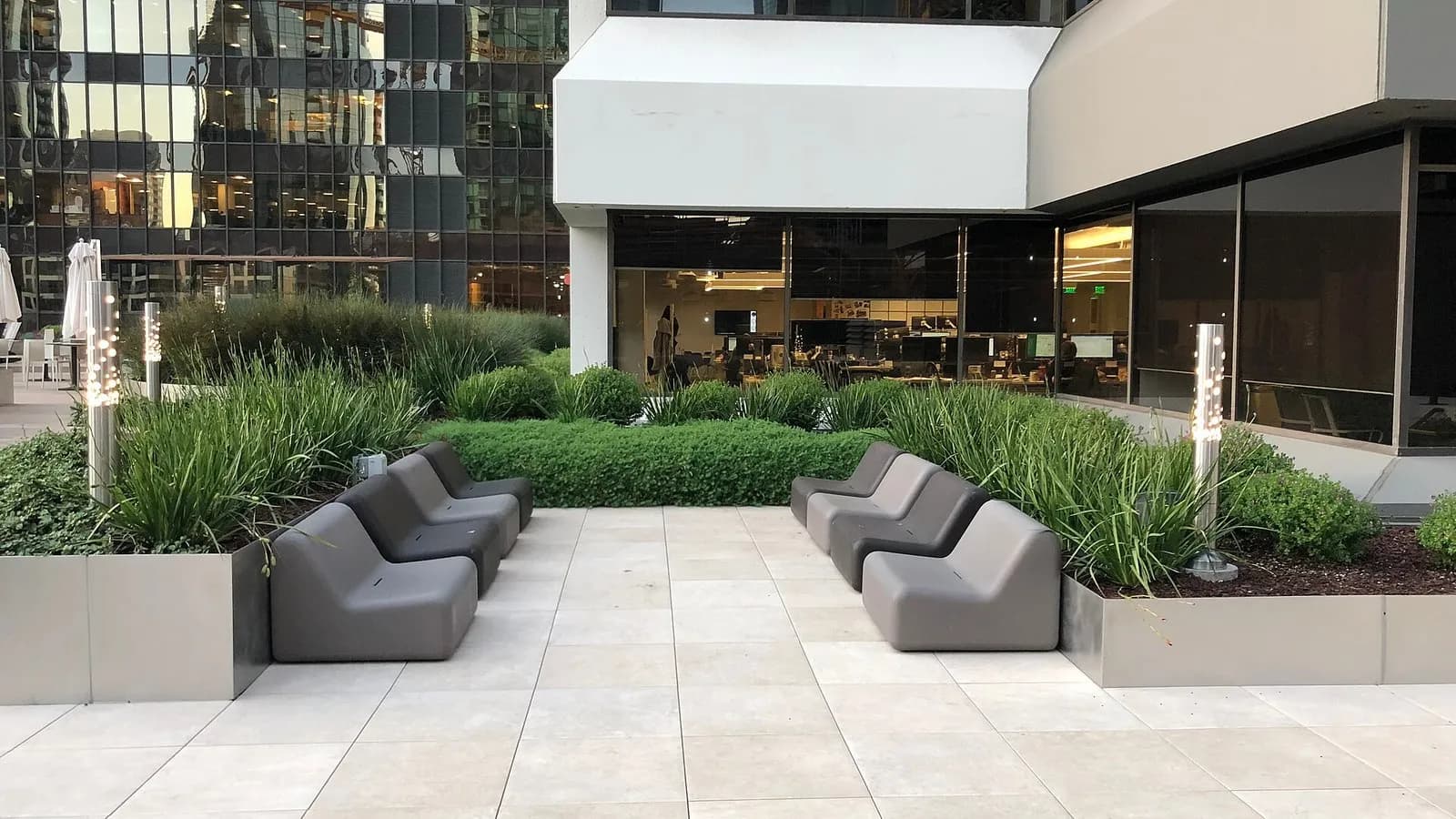 An outdoor breakout terrace with tables and planting at an office building on Main Street in the South of Market district of San Francisco, photographed on 12 December 2018, a file photograph of a tech-district office and not of Anthropic