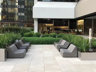 An outdoor breakout terrace with tables and planting at an office building on Main Street in the South of Market district of San Francisco, photographed on 12 December 2018, a file photograph of a tech-district office and not of Anthropic