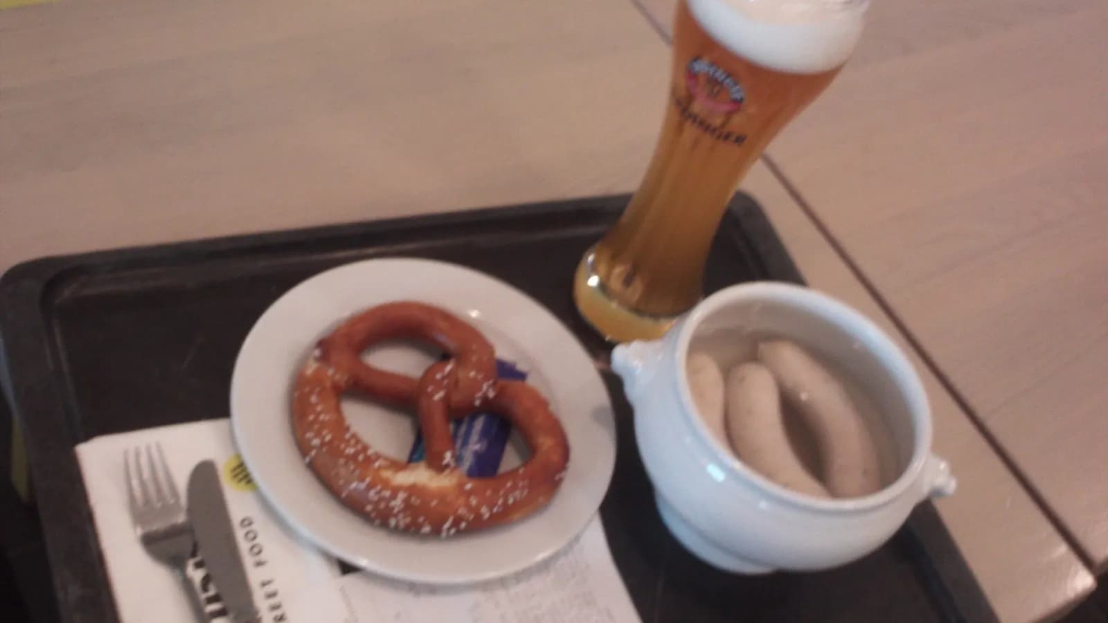 A Bavarian pretzel served with beer and weisswurst in Munich, illustrative of the dish and not this recipe's own bake, photograph undated