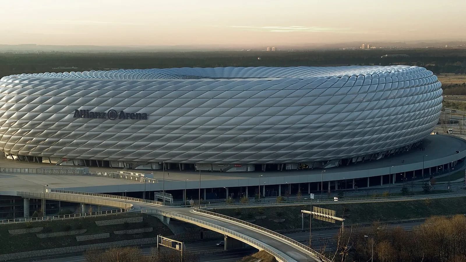 The Allianz Arena in Munich in daylight with its white inflated panels and a road curving past it, photographed on 8 January 2008, a file photograph of the stadium and not from Wednesday's match