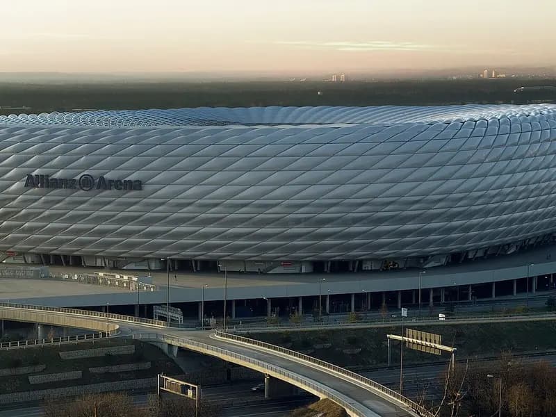 The Allianz Arena in Munich in daylight with its white inflated panels and a road curving past it, photographed on 8 January 2008, a file photograph of the stadium and not from Wednesday's match