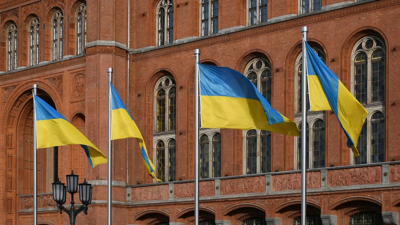 The Rotes Rathaus, Berlin's city hall and the seat of its governing mayor, with Ukrainian flags flying outside, photographed in May 2025