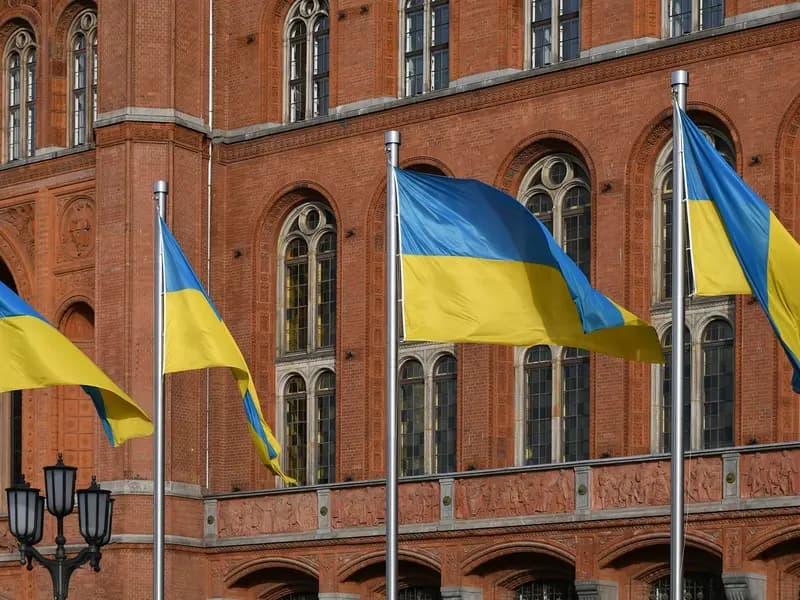The Rotes Rathaus, Berlin's city hall and the seat of its governing mayor, with Ukrainian flags flying outside, photographed in May 2025