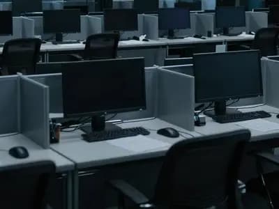Editorial illustration of a deserted trading floor at night with every screen dark