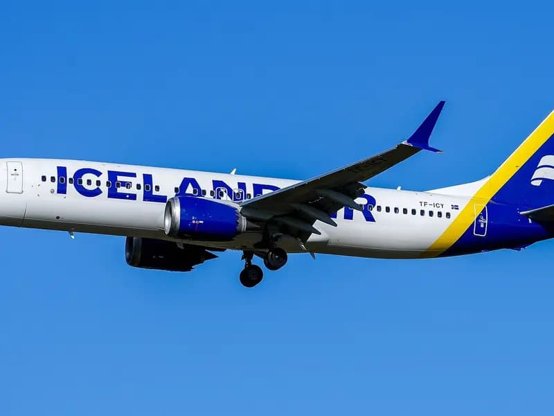 A Boeing 737-8 MAX in an Icelandair livery on final approach against a clear blue sky near Berlin Brandenburg Airport, photographed on 24 February 2024, a file photograph illustrative of the 737 MAX family and not of any aircraft in Boeing's quarterly deliveries