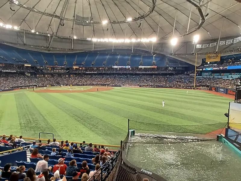 The playing field at Tropicana Field in St. Petersburg seen from the outfield stands past the rays touch tank during a game, photographed on 26 July 2024, a file photograph of the stadium and not of World Series Game 3