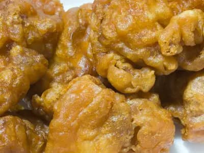 A close view of Japanese-style fried chicken, karaage, with its uneven golden crust, photographed in December 2005