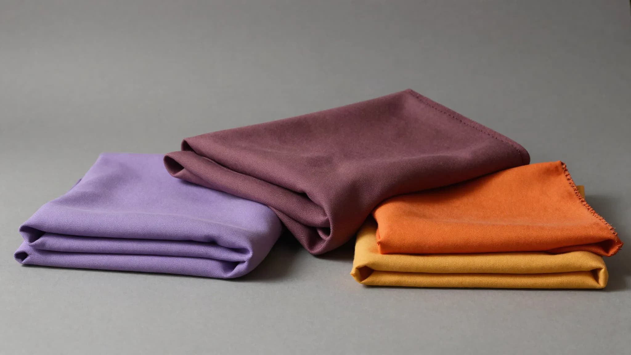 Fabric swatches in lilac and bright block colours