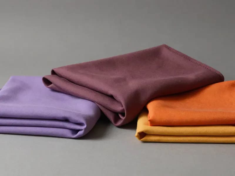Fabric swatches in lilac and bright block colours