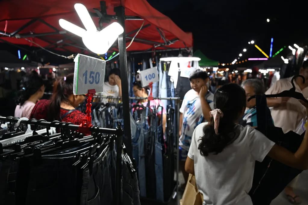 Consumer shopping on smartphone comparing prices and products online