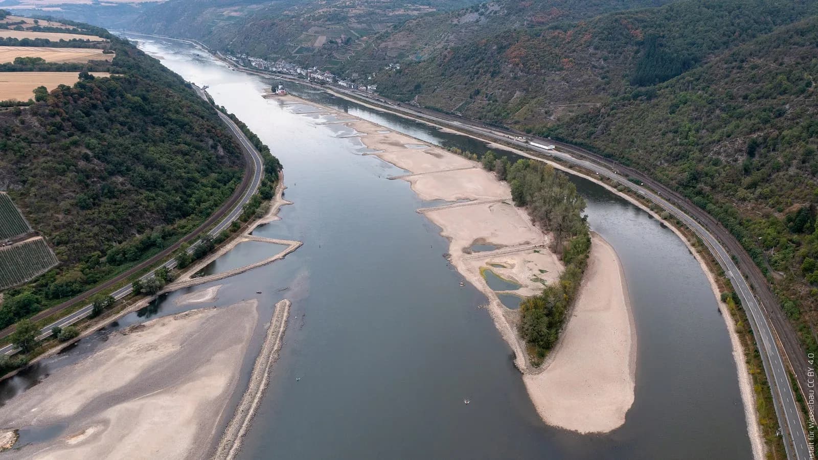 The Rhine at Bacharach with its gravel bed exposed at low water in August 2022, the last time the river ran this dry; Copernicus reports exceptionally low flows again this August