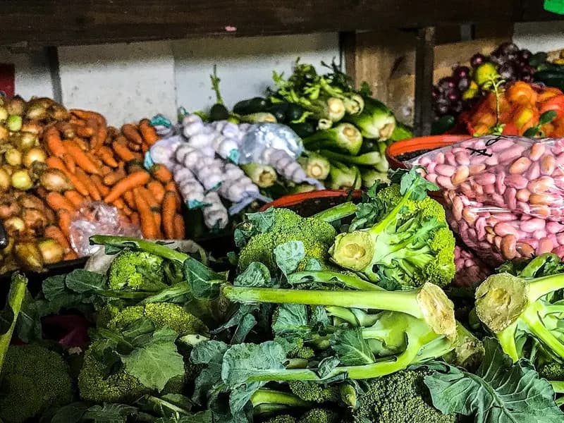 Broccoli, carrots, onions and garlic piled at a vegetable market stall, photographed in July 2017, a file photograph illustrative of potassium-rich foods and not of the study groceries