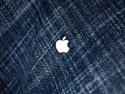 Folded denim jeans showing seam and wash detail