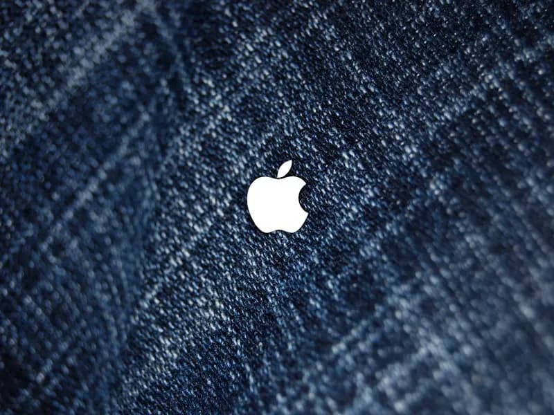 Folded denim jeans showing seam and wash detail