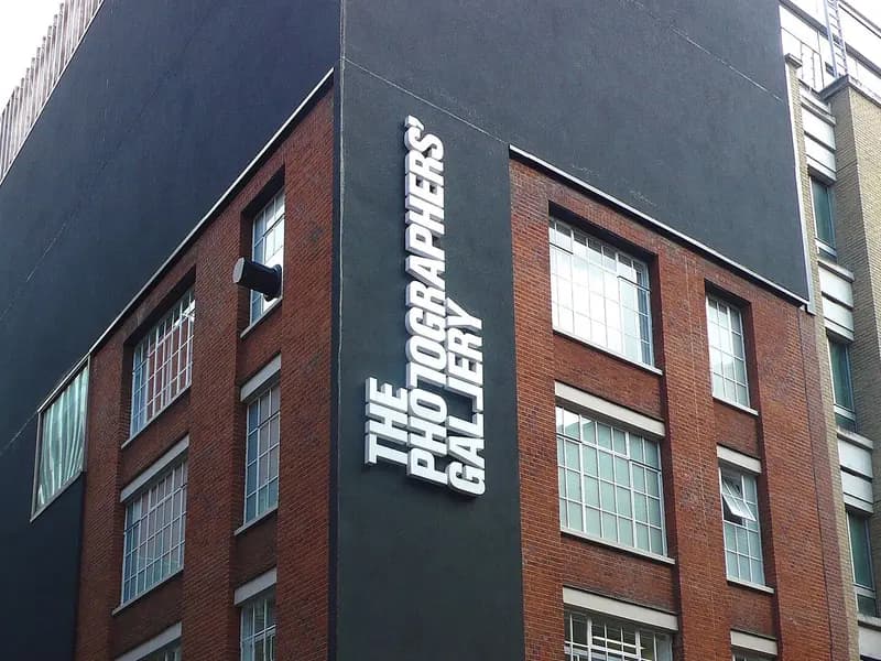 The dark upper facade and white lettering of The Photographers' Gallery on a brick street in Soho, London, photographed around 2013, a file photograph of the venue that will host the 2027 shortlist exhibition