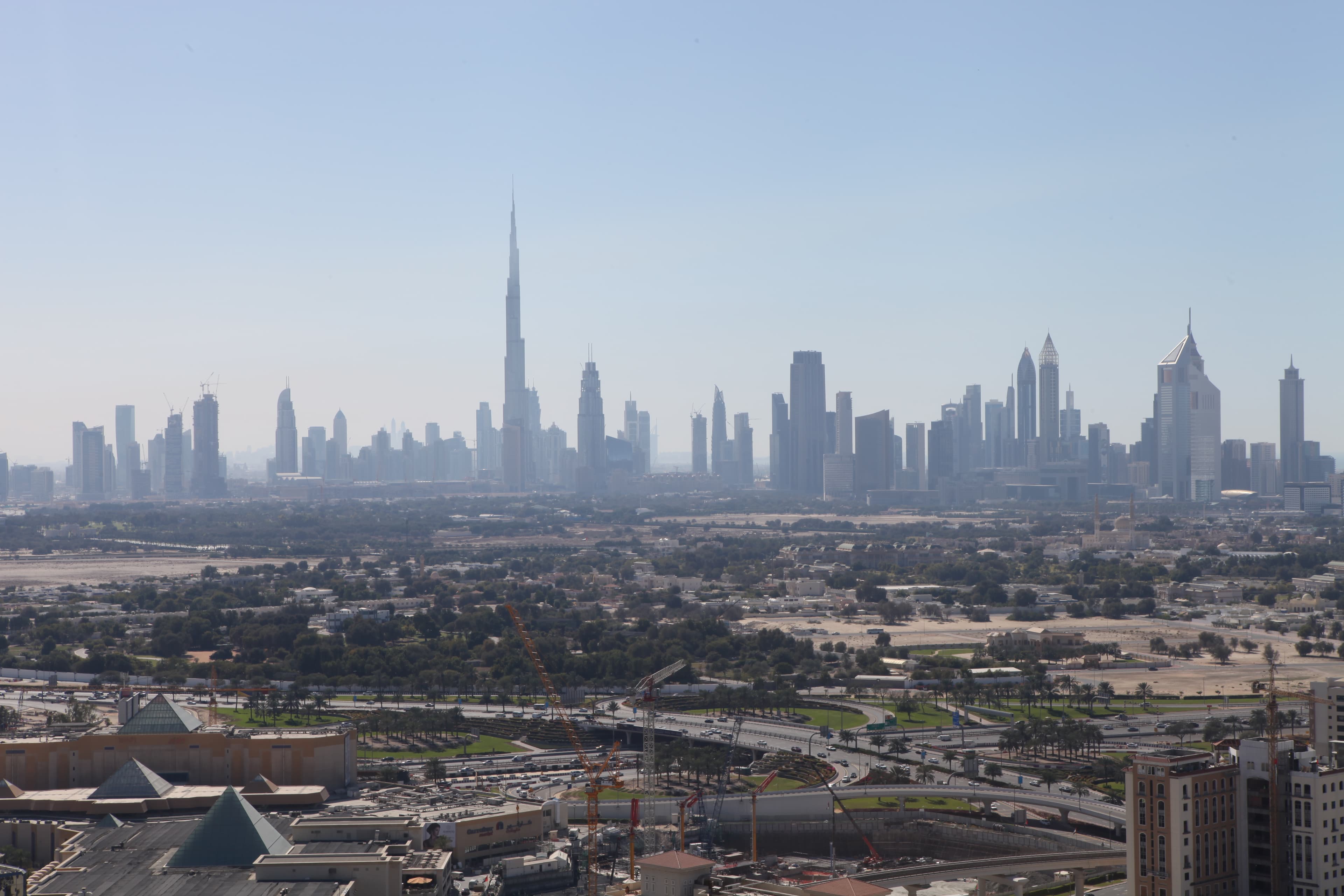 Visitors looking across Dubai's skyline during the summer travel season