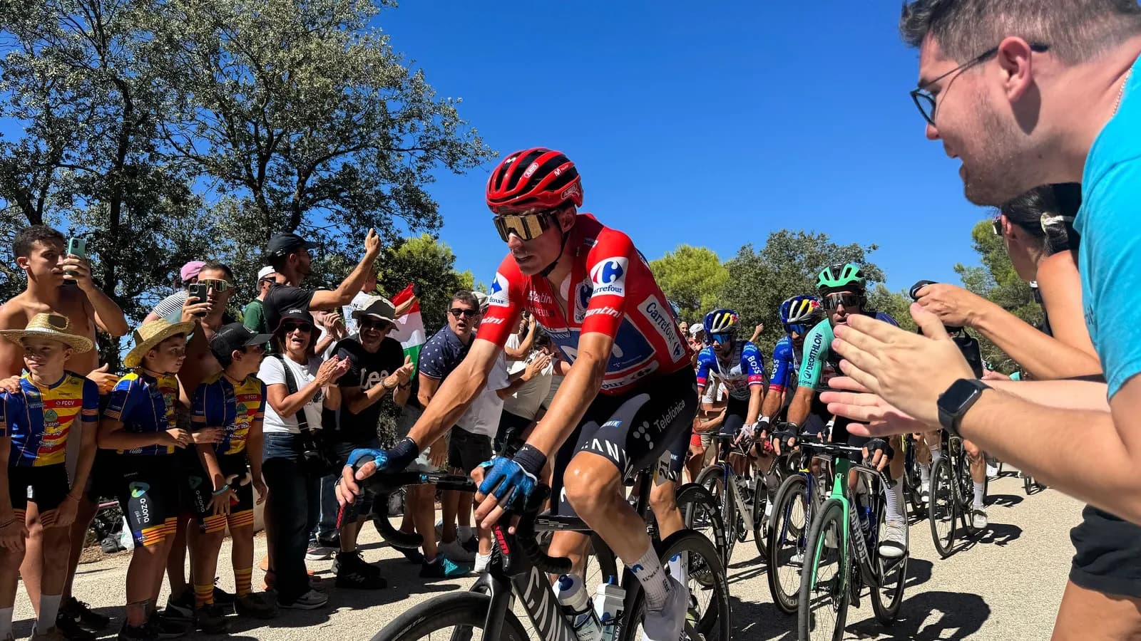 Enric Mas of Movistar riding stage nine of the 2026 Vuelta a España on 30 August, the day he won on the Alto de Aitana in the red jersey