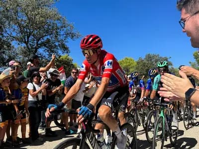 Enric Mas of Movistar riding stage nine of the 2026 Vuelta a España on 30 August, the day he won on the Alto de Aitana in the red jersey