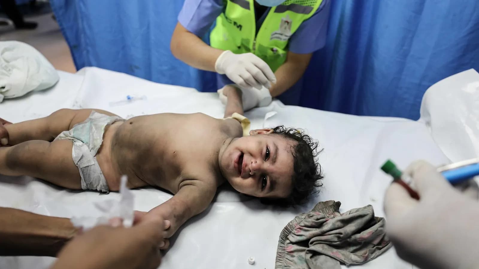 Damage in the Gaza Strip during the war, illustrative of the destruction referenced in the death toll report and not a scene from this week, photographed in October 2023
