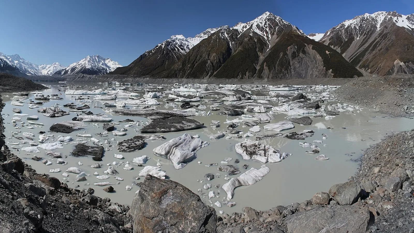 Tasman Lake in New Zealand filled with floating ice blocks beneath snow-capped mountains, photographed on 5 October 2010, a file photograph of a glacier that ends in a lake and not of the study's data