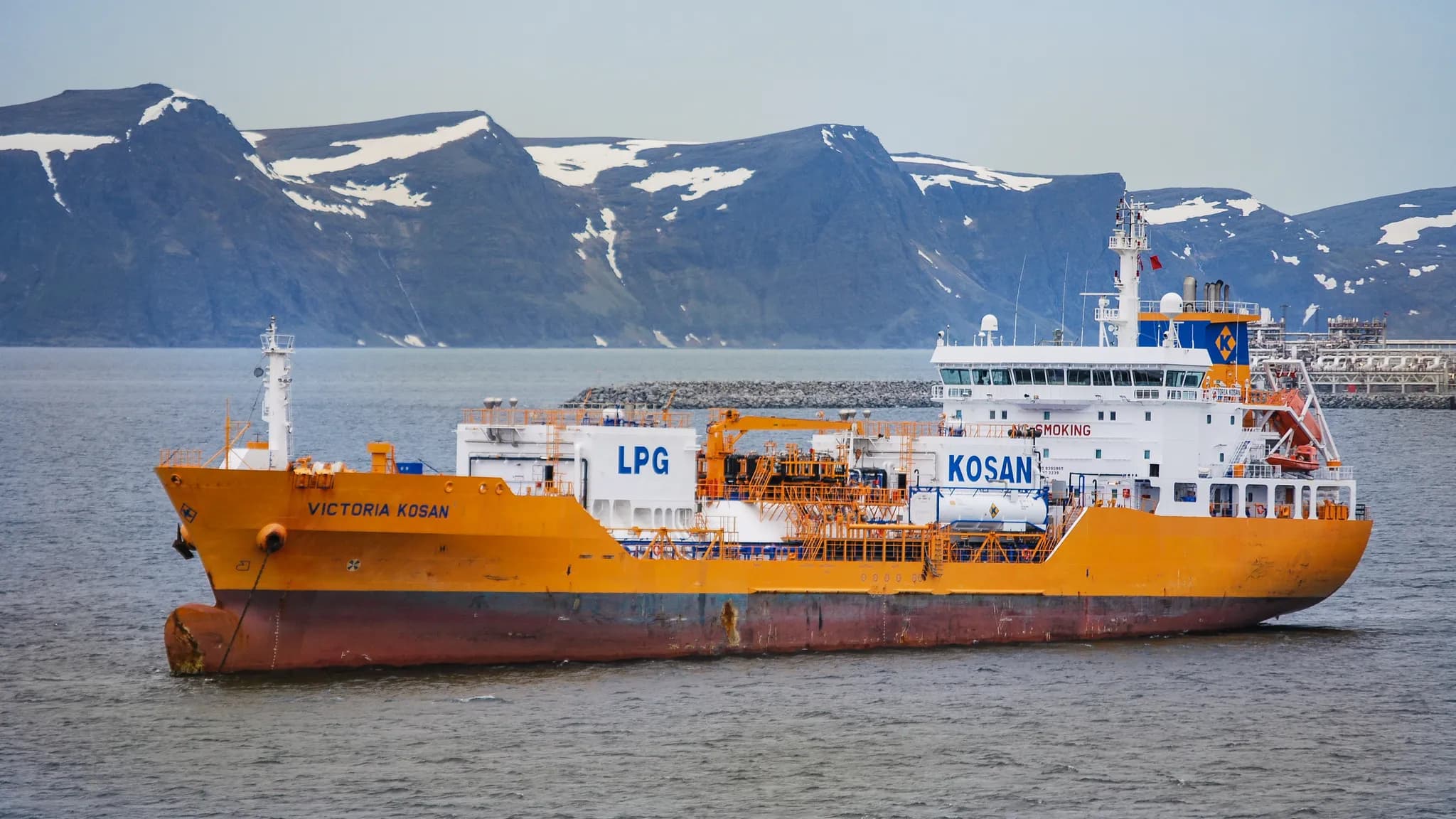 An LNG tanker and terminal representing the global natural-gas supply chain