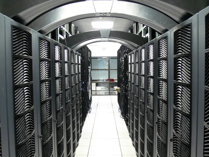 A university data center server room, illustrative of the computing infrastructure behind frontier AI models and not a facility belonging to any of the three companies, photographed in January 2008