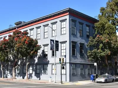 The Pioneer Building at 3180 18th Street in San Francisco's Mission District, OpenAI's headquarters, photographed in July 2019