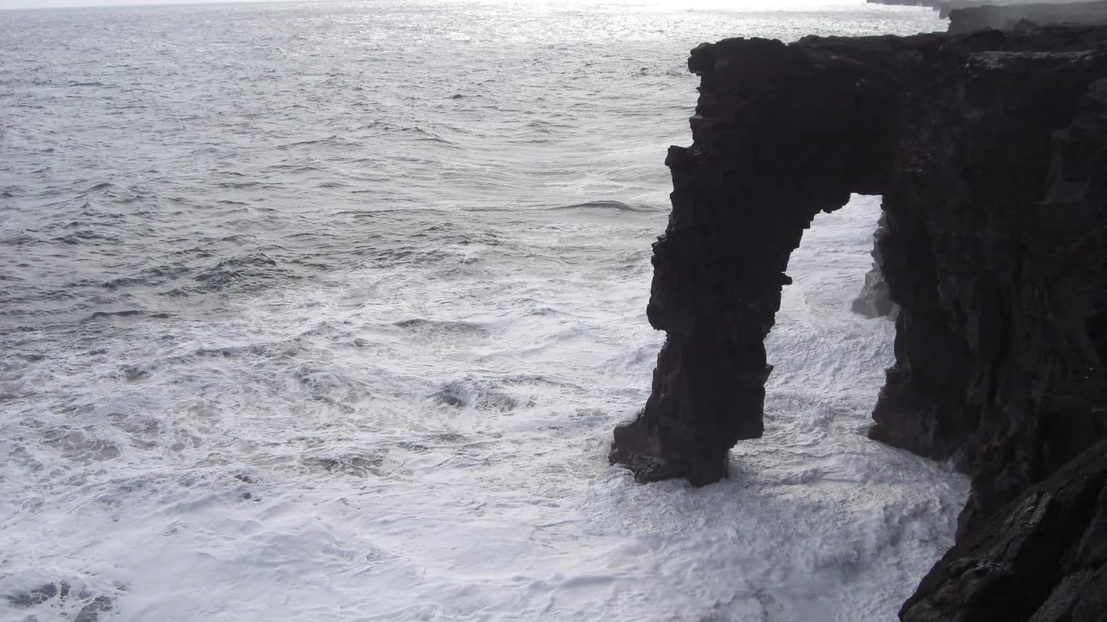 The Holei Sea Arch on the Kalapana coast, Hawaii, photographed while it was still standing, long before the collapse in September 2026