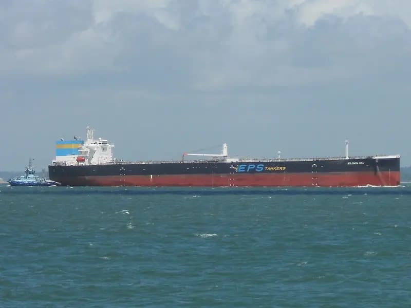 A large crude oil tanker with a tug alongside moving through coastal waters in the Solent, England, photographed on 11 June 2022, a file photograph illustrative of oil tankers and not of any vessel attacked near the Strait of Hormuz