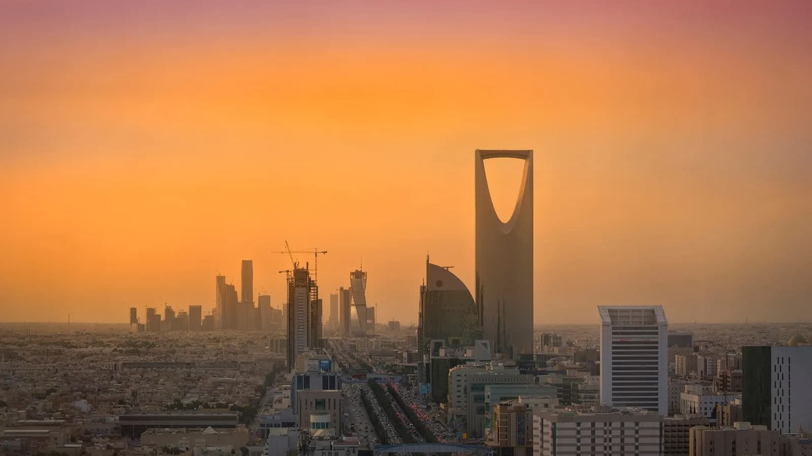 The Riyadh skyline at dusk with the Kingdom Centre and the King Abdullah Financial District, photographed in April 2016