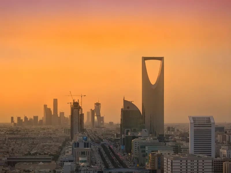 The Riyadh skyline at dusk with the Kingdom Centre and the King Abdullah Financial District, photographed in April 2016