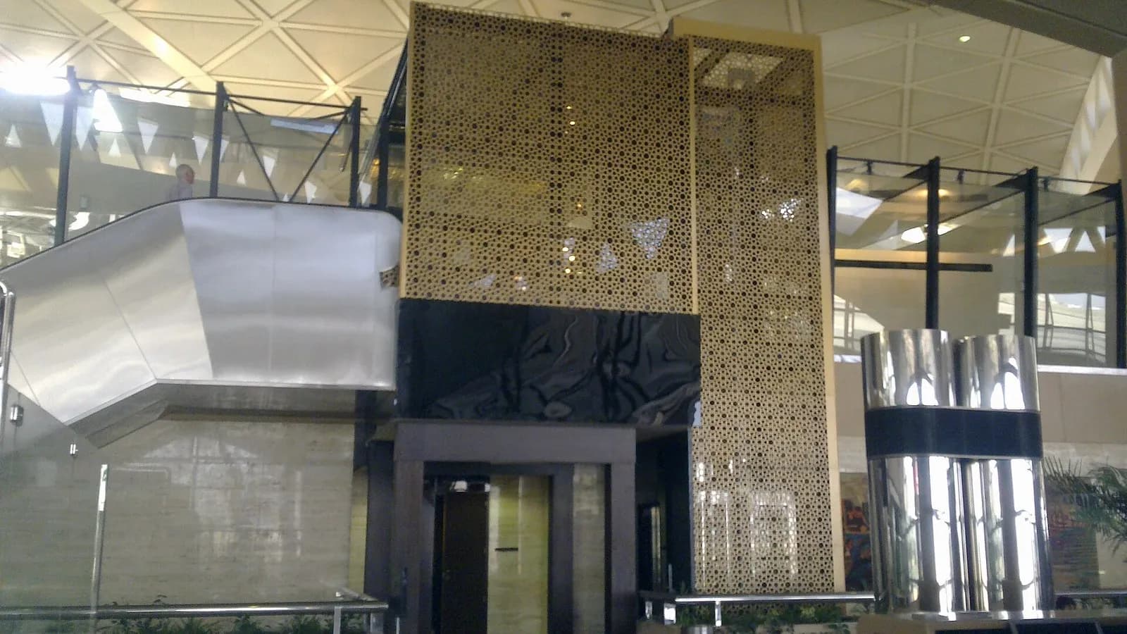 A gold-latticed screen, glass balustrade and polished fittings in a terminal hall at King Khalid International Airport in Riyadh, photographed on 3 July 2012, a file photograph of the airport named in the Houthi claims and not of any attack or damage